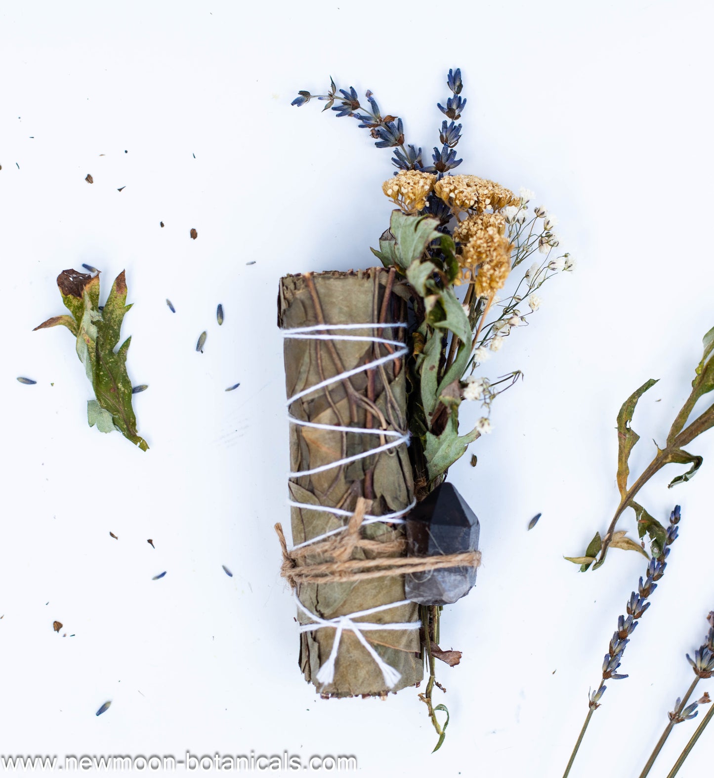 Eucalyptus smudge sticks with herbs and crystals