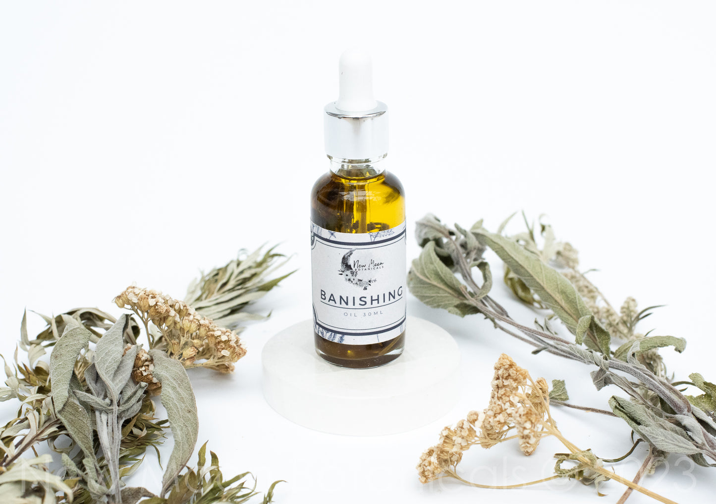 Banishing Oil with Botanicals & Essential Oils.