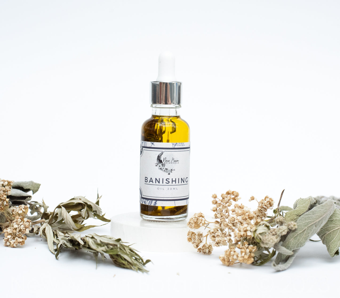 Banishing Oil with Botanicals & Essential Oils.