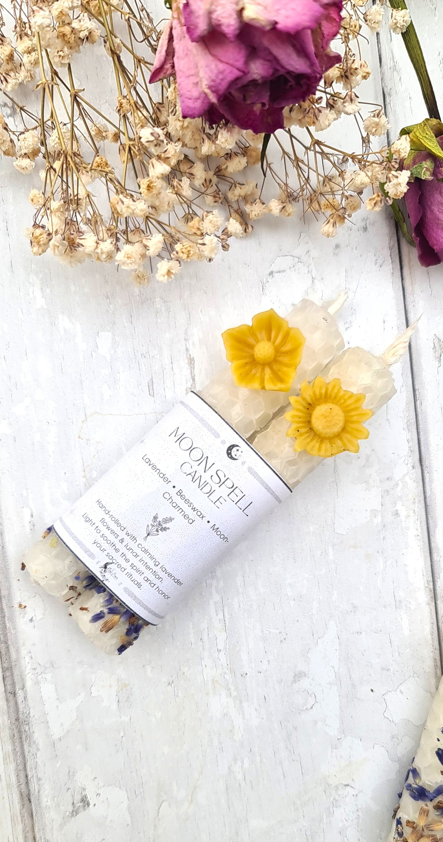 Beeswax candles with lavender flowers 